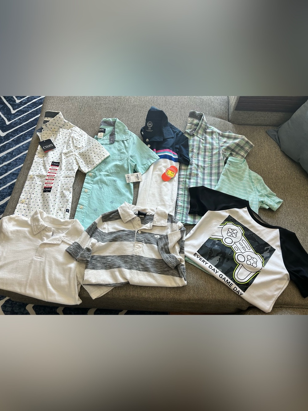 Boys size 6/7 shirt lot. 3 new with tags. Two have small stains, pictured